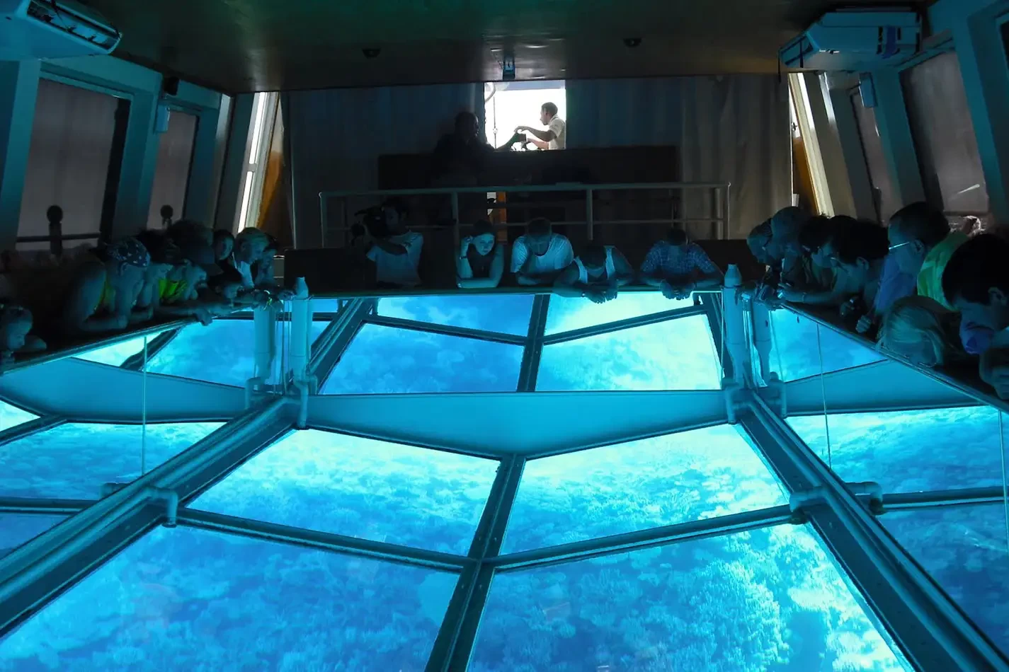 glass bottom boat cruising the Red Sea